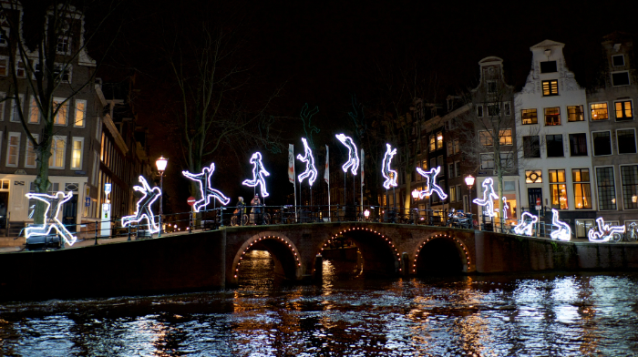 Figures on Bridge Amsterdam Light Festival 15 years of light art in Amsterdam (1).png 