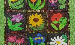Henny Meerman, The Netherlands. 'Lovely Flowers'. I had enough batik fabrics in my stash to make this colourful quilt from Helen Godden's The Flower Power Quiltalong.