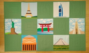 Lesley Arber, Essex UK. 'Around the World with Landda' quilt. This recently completed quilted wall hanging represents some of my and my husband's most treasured memories.