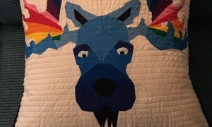 Sorcha Torrens, Bristol, UK. 'Rainbow Moose' cushion I have always wanted to visit Alaska mostly to see the moose in its natural habitat. My foundation pieced Rainbow Moose is the closest I have got so far! 